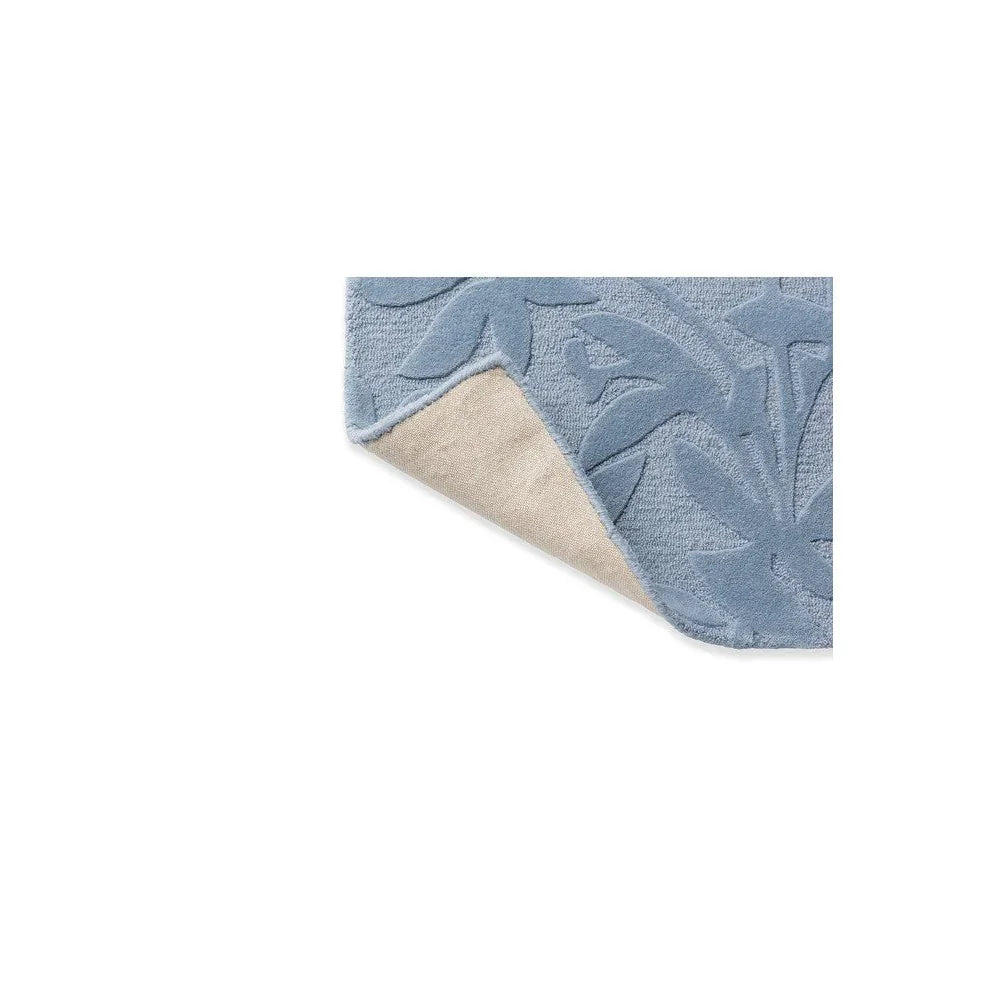 Laura Ashley Cleavers Seaspray Rug featuring leaf/botanical pattern in pale blue on beige backing, machine-made wool