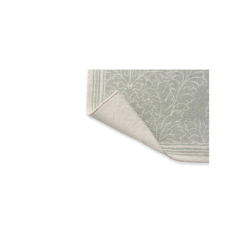 Laura Ashley Silchester Pale Sage Rug featuring botanical scroll pattern in sage, ivory and cream on pale sage background, machine-woven wool