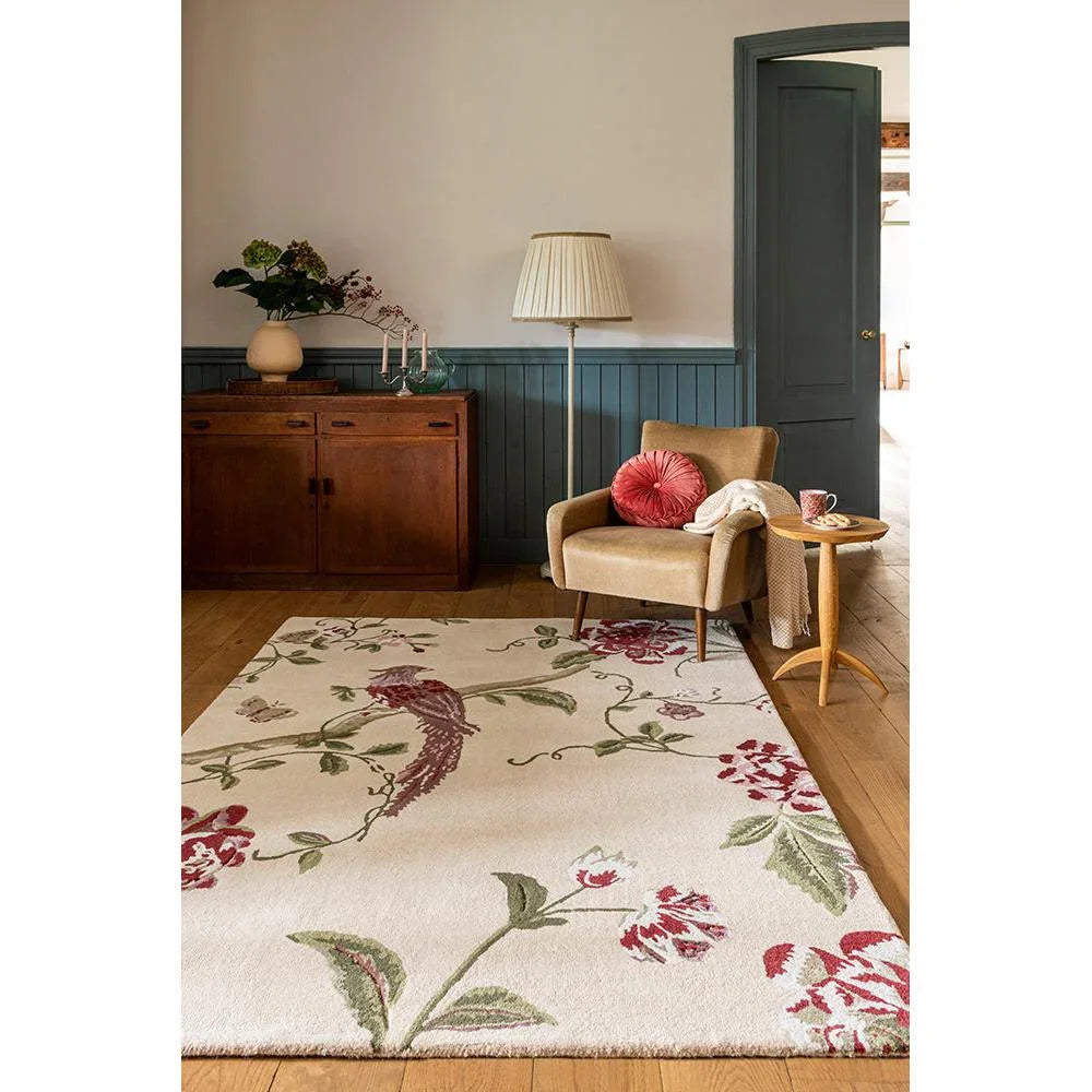 Laura Ashley Summer Palace Cranberry-Grape Rug featuring floral pattern in cranberry, grape and sage on cream background, hand-tufted wool