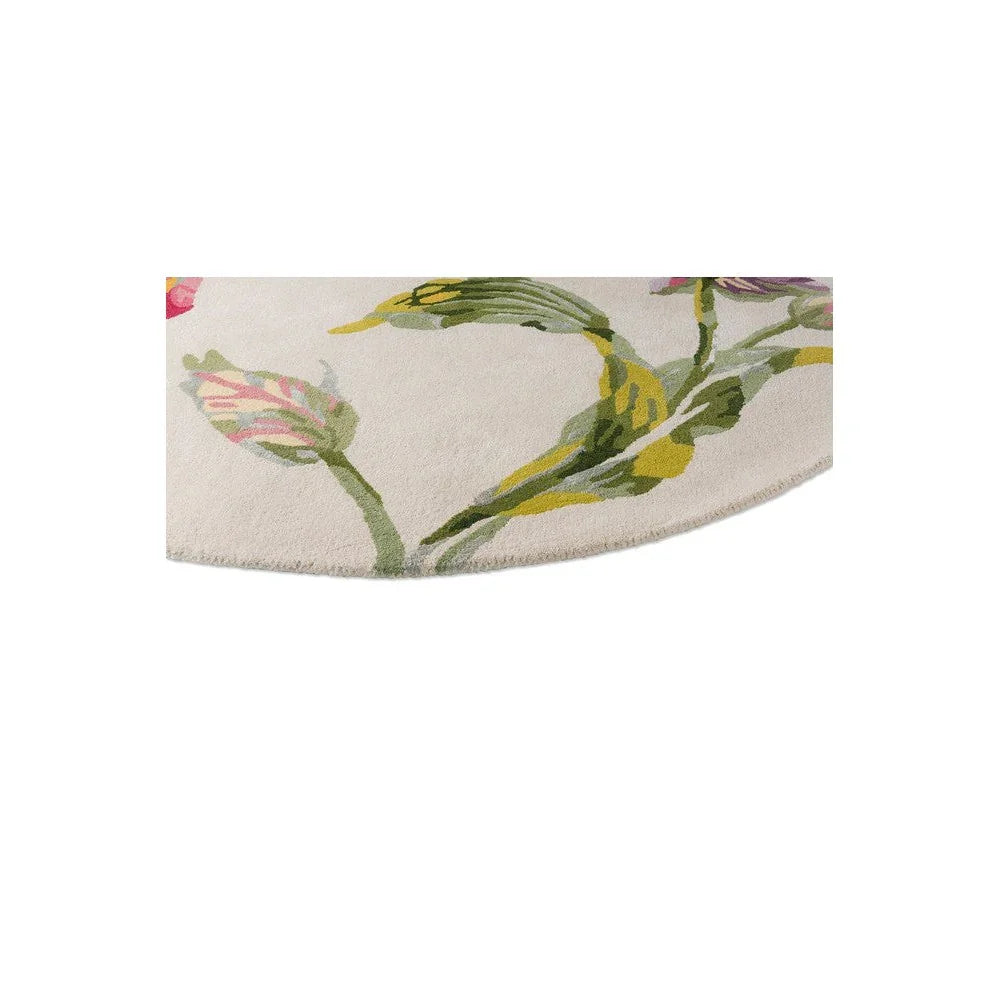 Laura Ashley Gosford Cranberry Designer Round Rug featuring botanical floral pattern in cream background with green, pink and yellow accents, hand-tufted wool