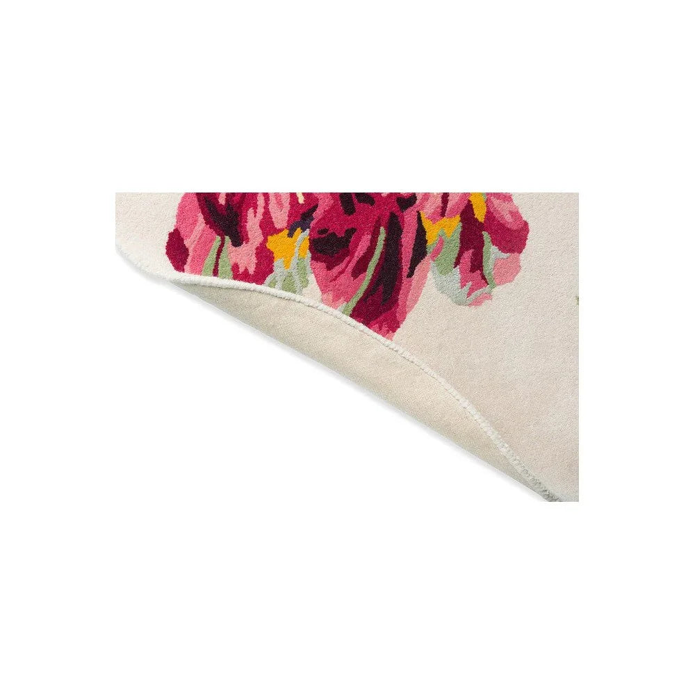 Laura Ashley Gosford Cranberry Round Rug featuring bold floral pattern in cranberry pink, magenta, yellow, lime on cream background