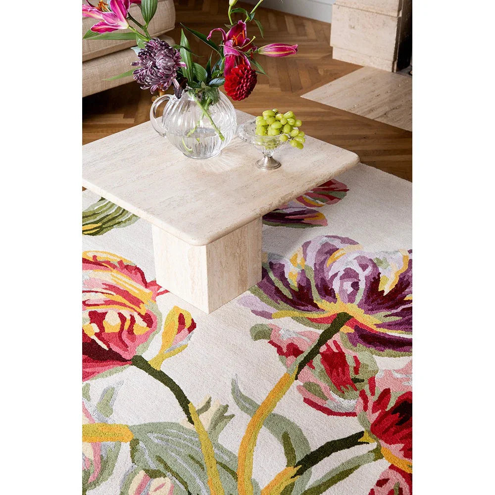 Laura Ashley Gosford Cranberry Designer Rug featuring bold floral pattern in cranberry, pink, purple, green on cream, machine-made polyester