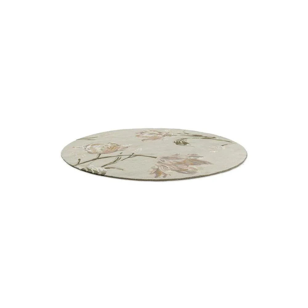 Laura Ashley Gosford Natural round rug featuring botanical floral pattern in sage green, dusty pink and cream on light beige, hand-tufted wool
