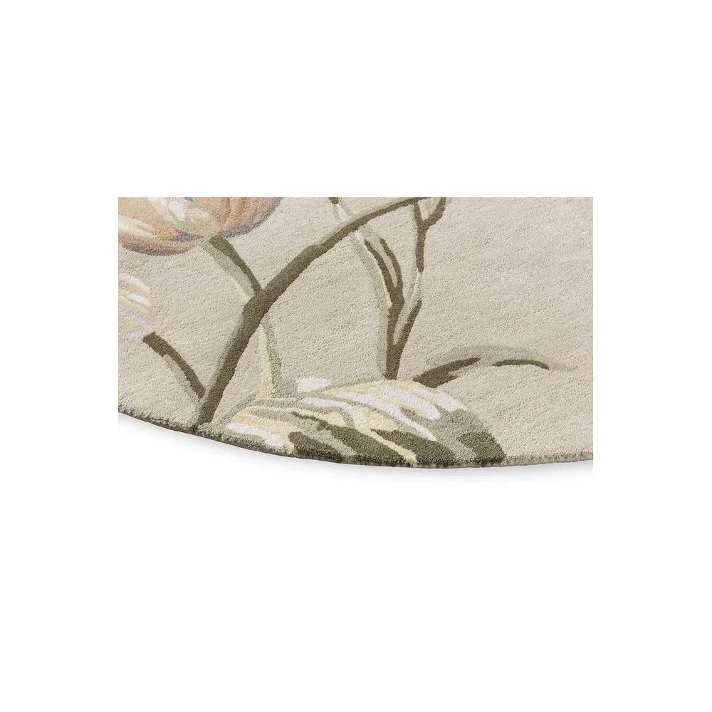 Laura Ashley Gosford Natural round rug featuring botanical floral pattern in sage green, cream and pale pink on beige background