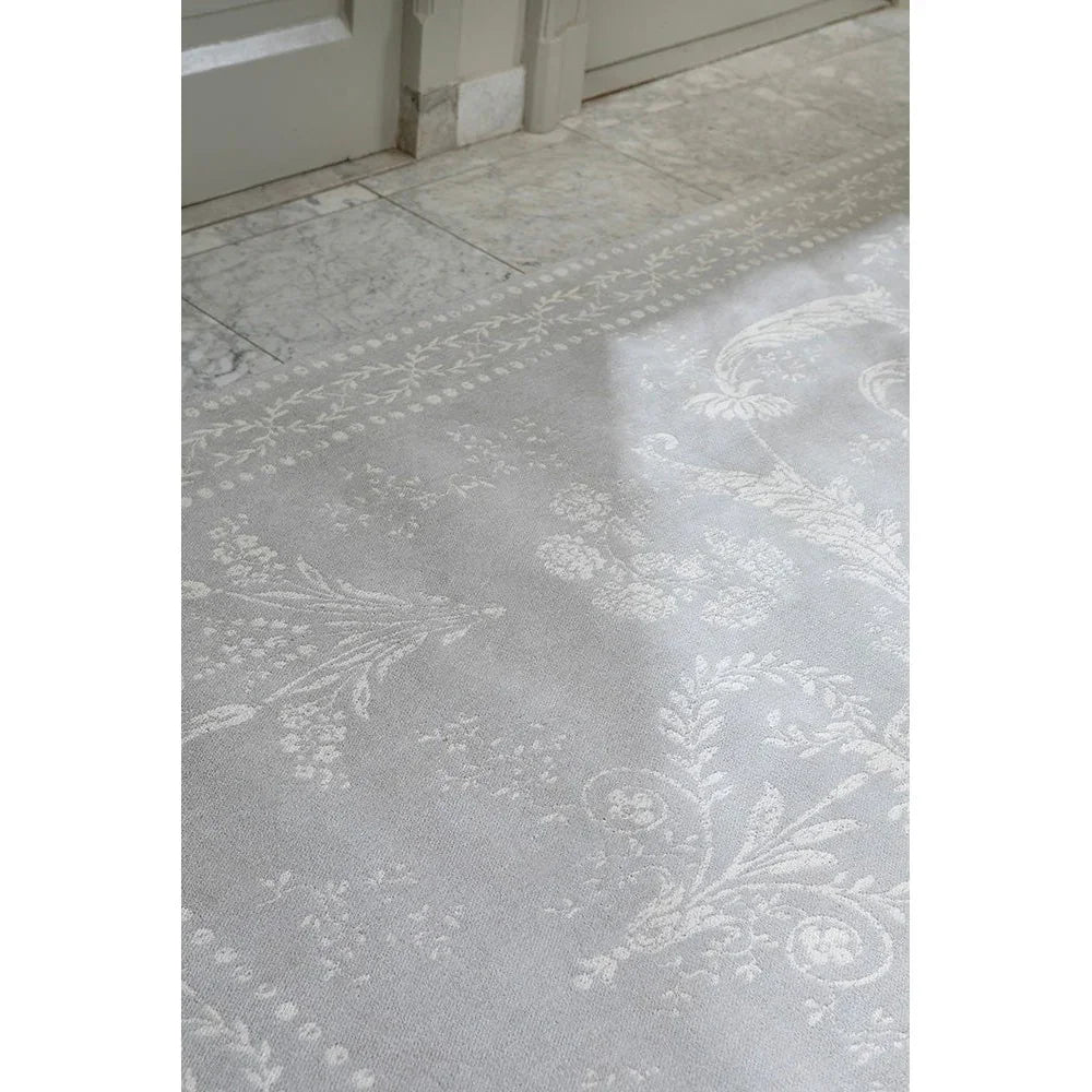 Laura Ashley Josette Dove Grey Designer Rug featuring white damask floral pattern on dove grey background, construction method unknown, material unknown