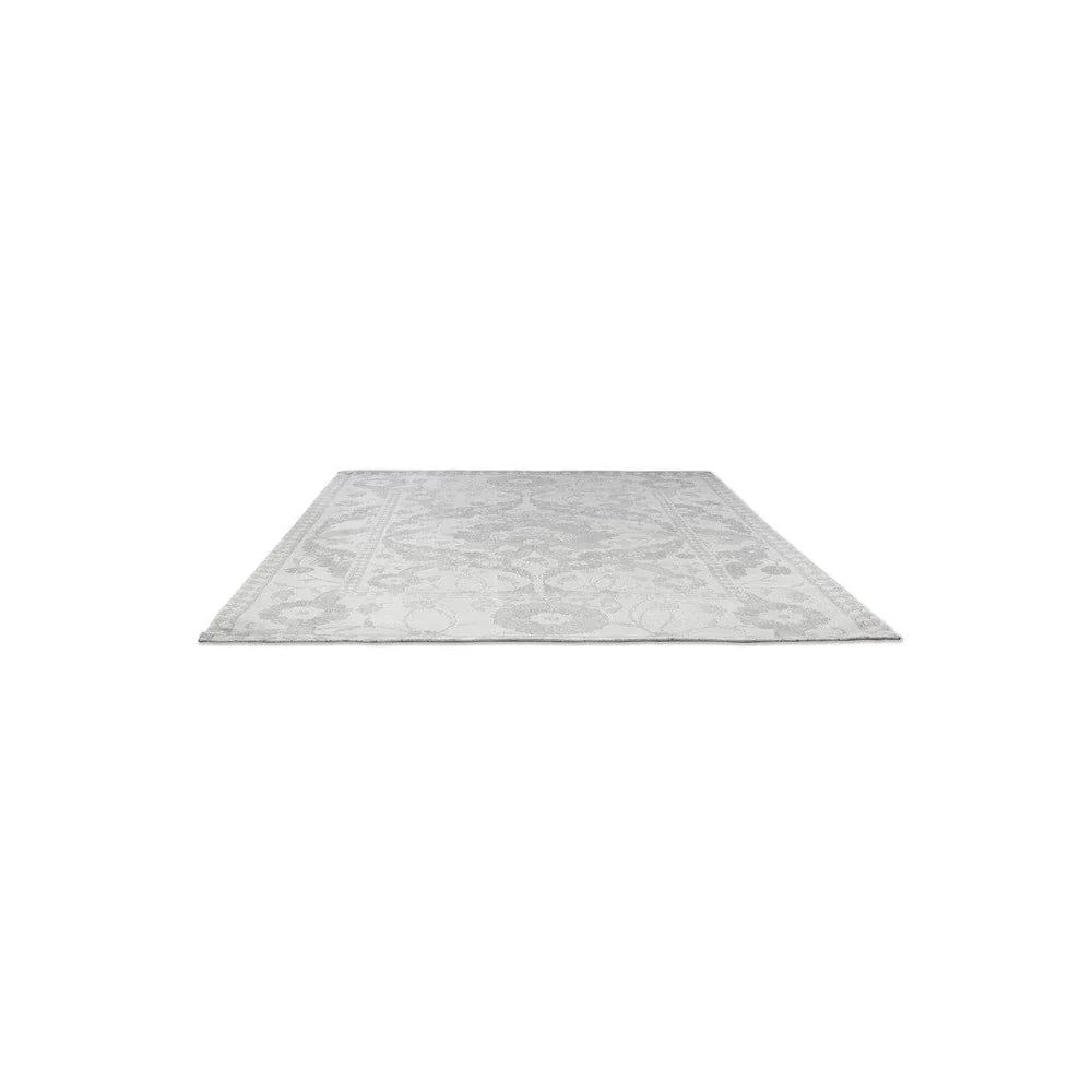 Laura Ashley Newborough Steel Designer Rug featuring floral pattern in steel, steel grey and ivory on cream background, hand-tufted wool