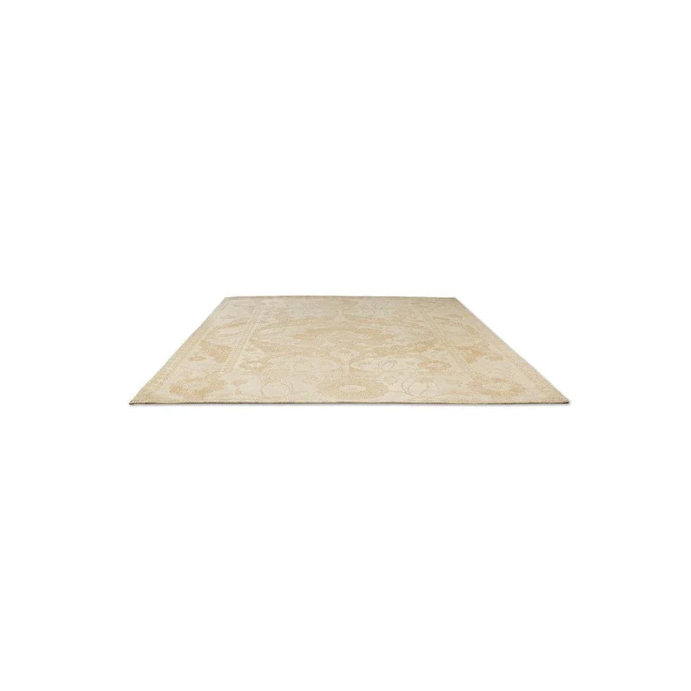 Laura Ashley Newborough Pale Gold Designer Rug featuring subtle floral pattern in pale gold and ivory on cream background, machine-woven polyester