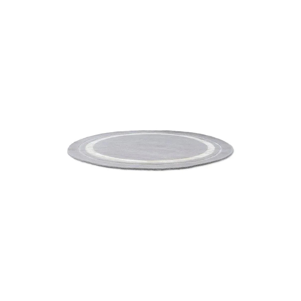 Laura Ashley Redbrook Silver Designer Round Rug featuring concentric ring pattern in silver, light grey and ivory on white background, machine-made polyester