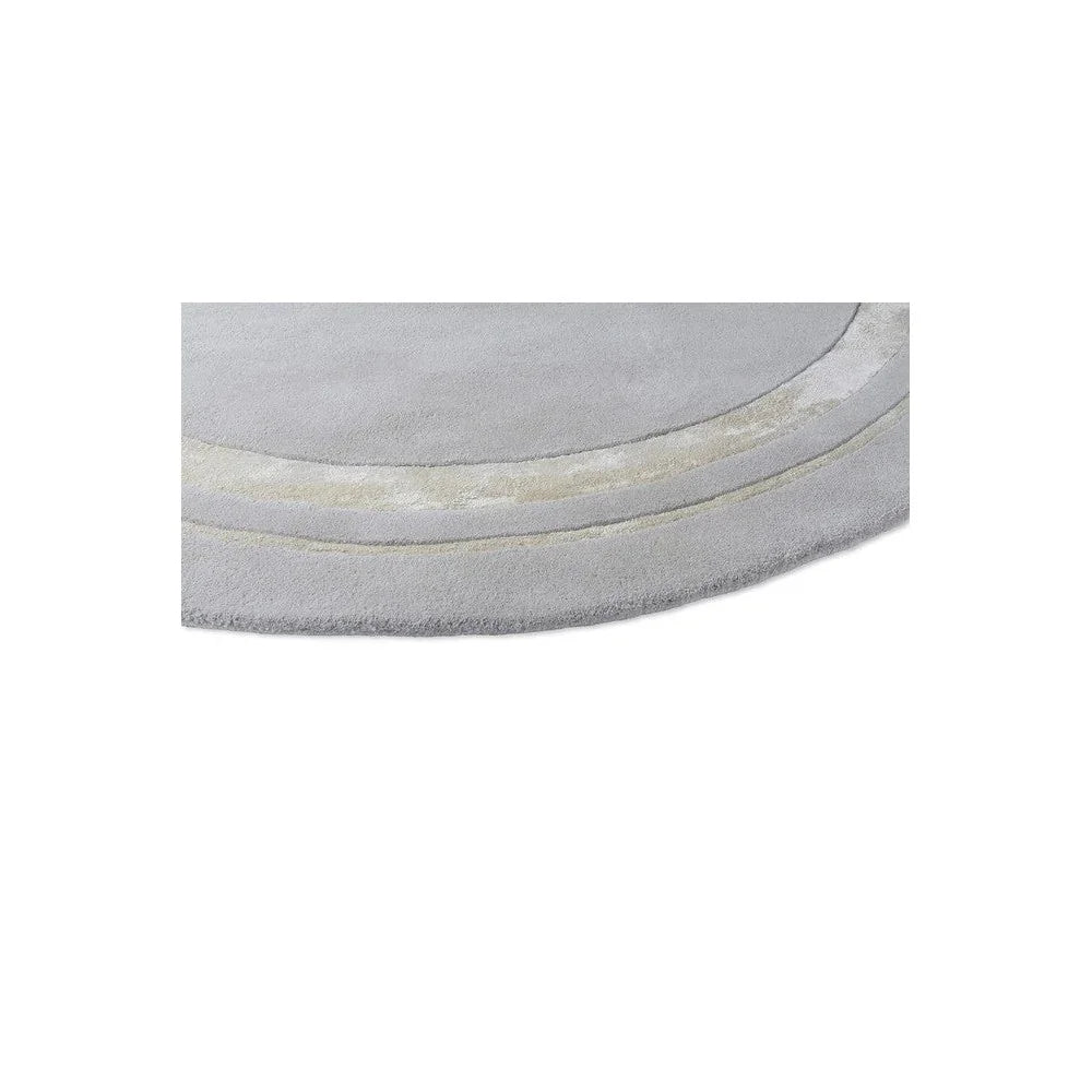 Laura Ashley Redbrook Silver Designer Round Rug featuring circular banded design in silver, ivory and pale grey on light grey background, machine-woven polyester