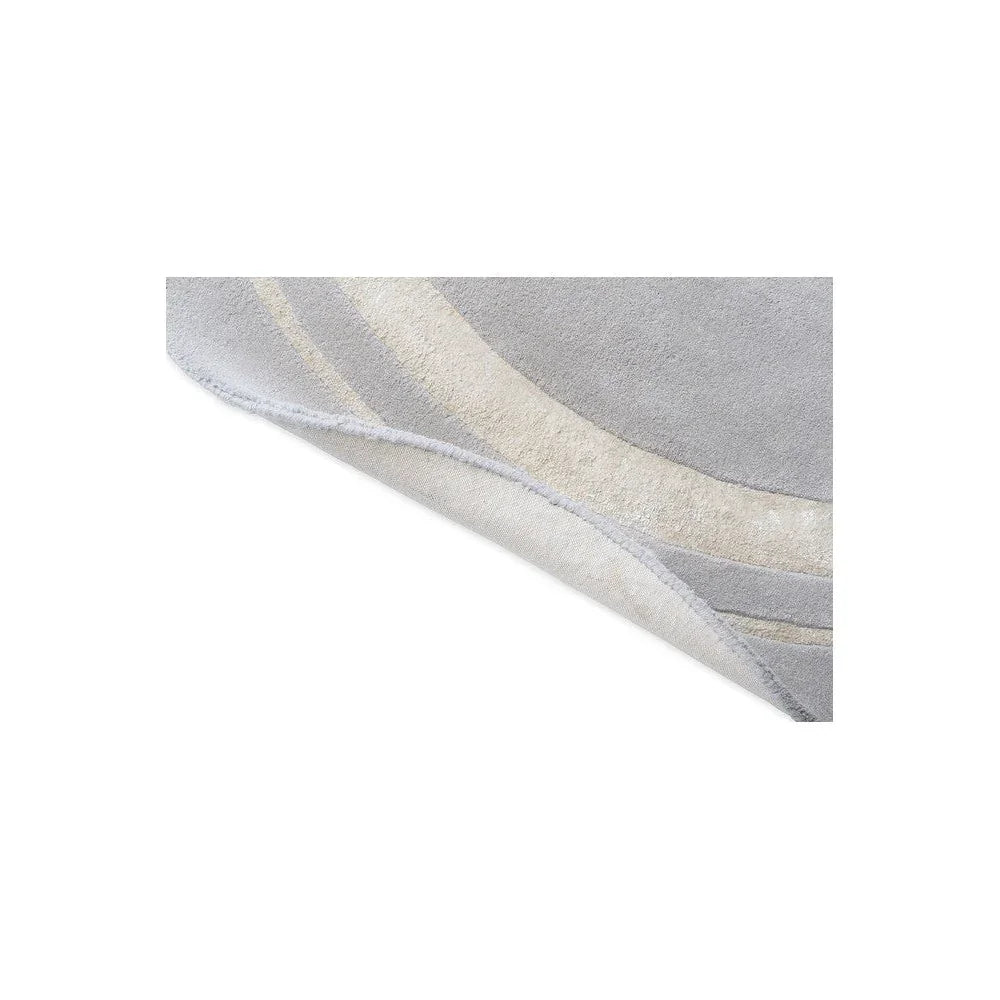 Laura Ashley Redbrook Silver round rug featuring abstract curved stripes in silver-grey and ivory on pale background, machine-woven rug