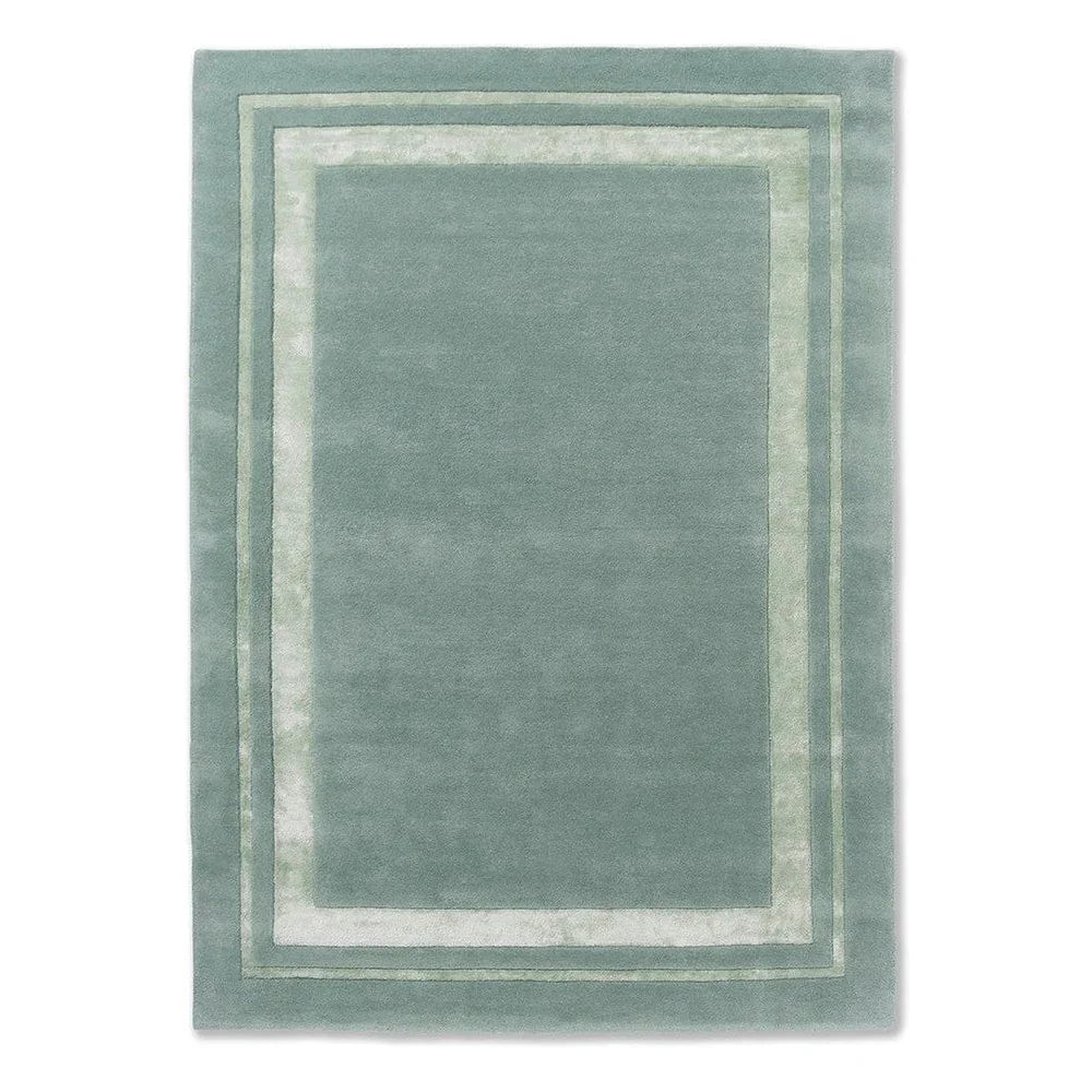 Laura Ashley Redbrook Duck Egg Designer Rug featuring bordered frame in duck-egg blue and ivory on duck-egg background, hand-tufted wool