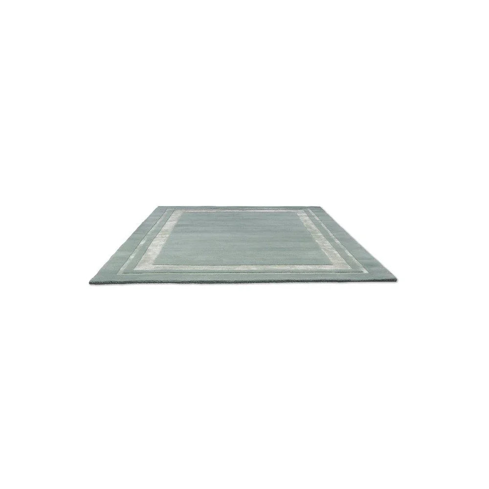 Laura Ashley Redbrook Duck Egg Rug featuring bordered pattern in duck egg, cream on pale blue background, hand-tufted wool