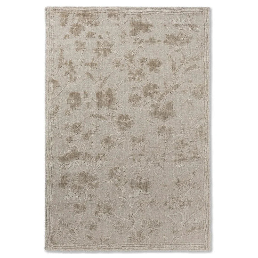 Laura Ashley Rye Natural Designer Rug featuring subtle floral pattern in beige, taupe and cream on natural background, hand-tufted wool