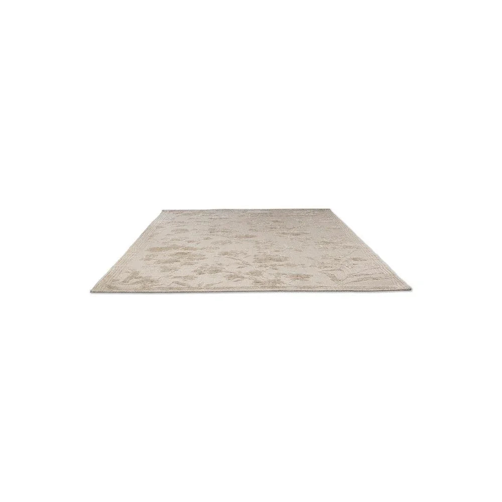 Laura Ashley Rye Natural Designer Rug featuring subtle pattern in cream and beige on natural background, hand-tufted wool