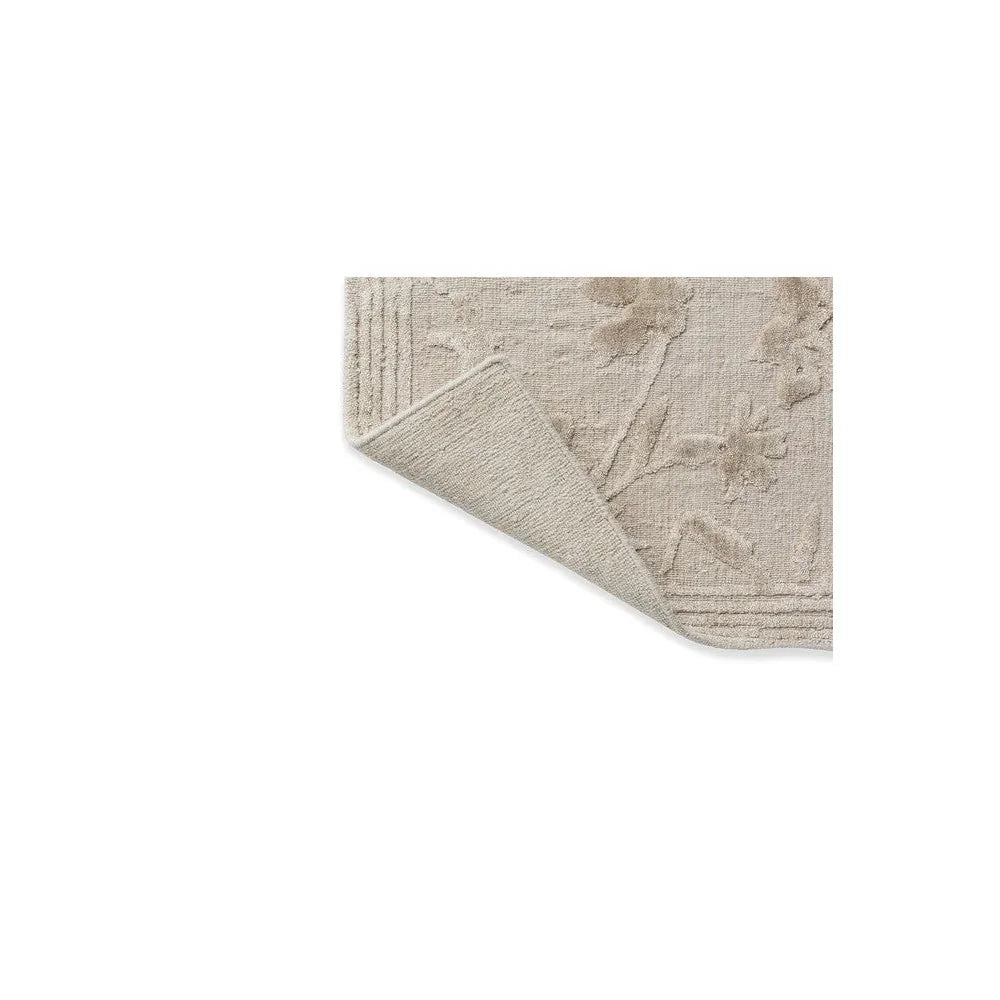 Laura Ashley Rye Natural Designer Rug featuring embossed floral border in cream, taupe and beige on ivory background, machine-made wool