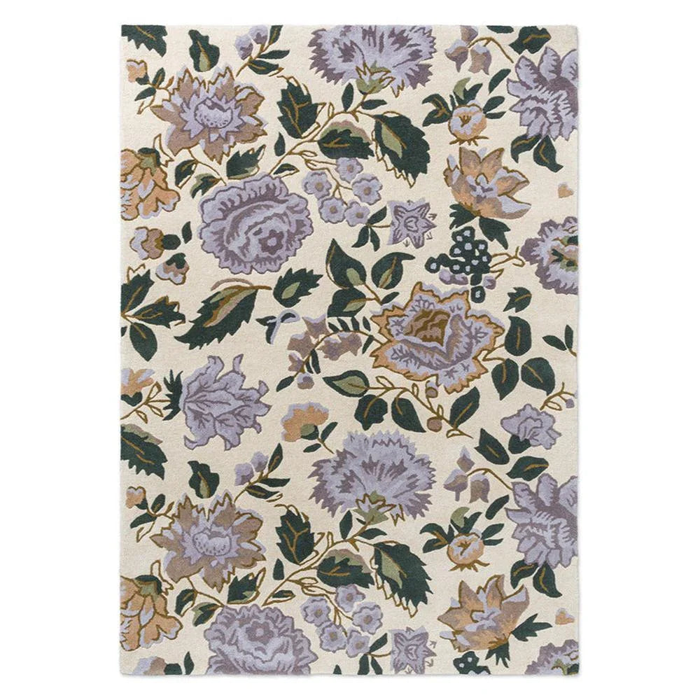 Laura Ashley Wendling Floral rug featuring floral pattern in heather purple, lilac, sage green on cream background, machine-woven wool blend