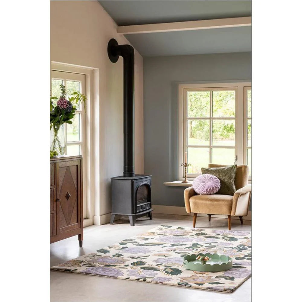 Laura Ashley Wendling Floral Heather Purple Rug featuring lavender, sage green and cream on ivory background, hand-tufted wool