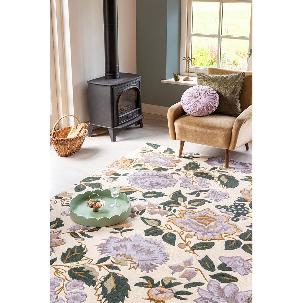 Laura Ashley Wendling Floral Rug featuring floral pattern in lavender, sage green and ochre on cream background, machine-woven wool