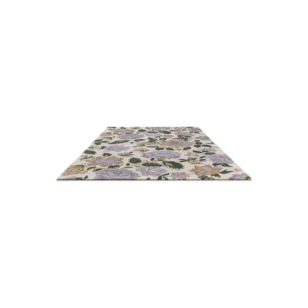 Laura Ashley Wendling Floral Rug featuring floral pattern in heather purple, lavender, sage green on cream background, hand-tufted wool