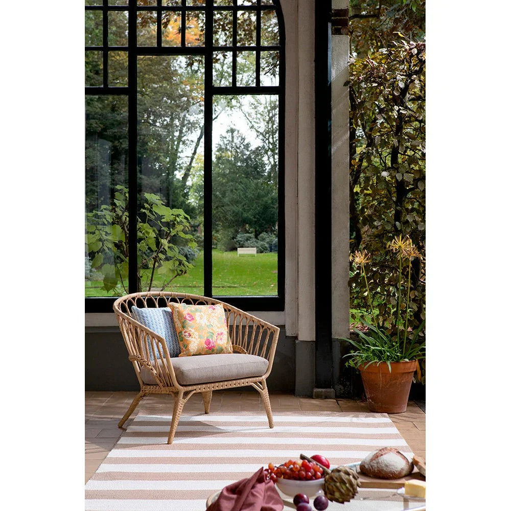 Laura Ashley Lille Pale Ochre Outdoor Rug featuring pale ochre and cream striped pattern on beige background; hand-woven polypropylene