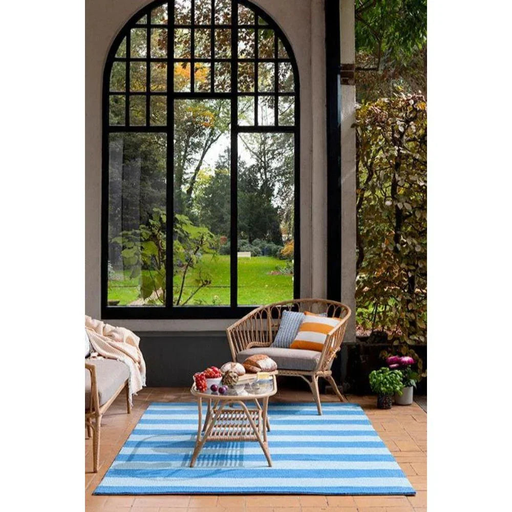 Laura Ashley Lille Sky Blue Outdoor Rug featuring sky blue and white stripes on light blue background, outdoor-ready polypropylene