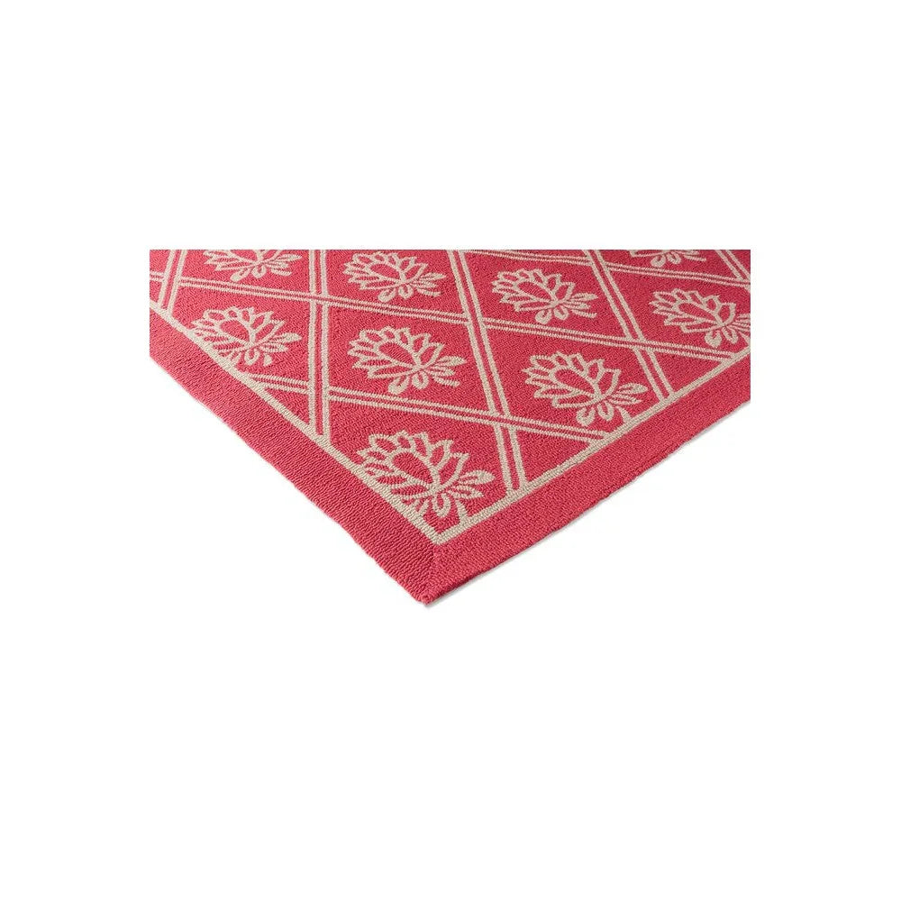 Laura Ashley Porchester Poppy Red Outdoor Rug featuring geometric grid and white floral motifs in poppy red and white on red background, machine-loomed polypropylene