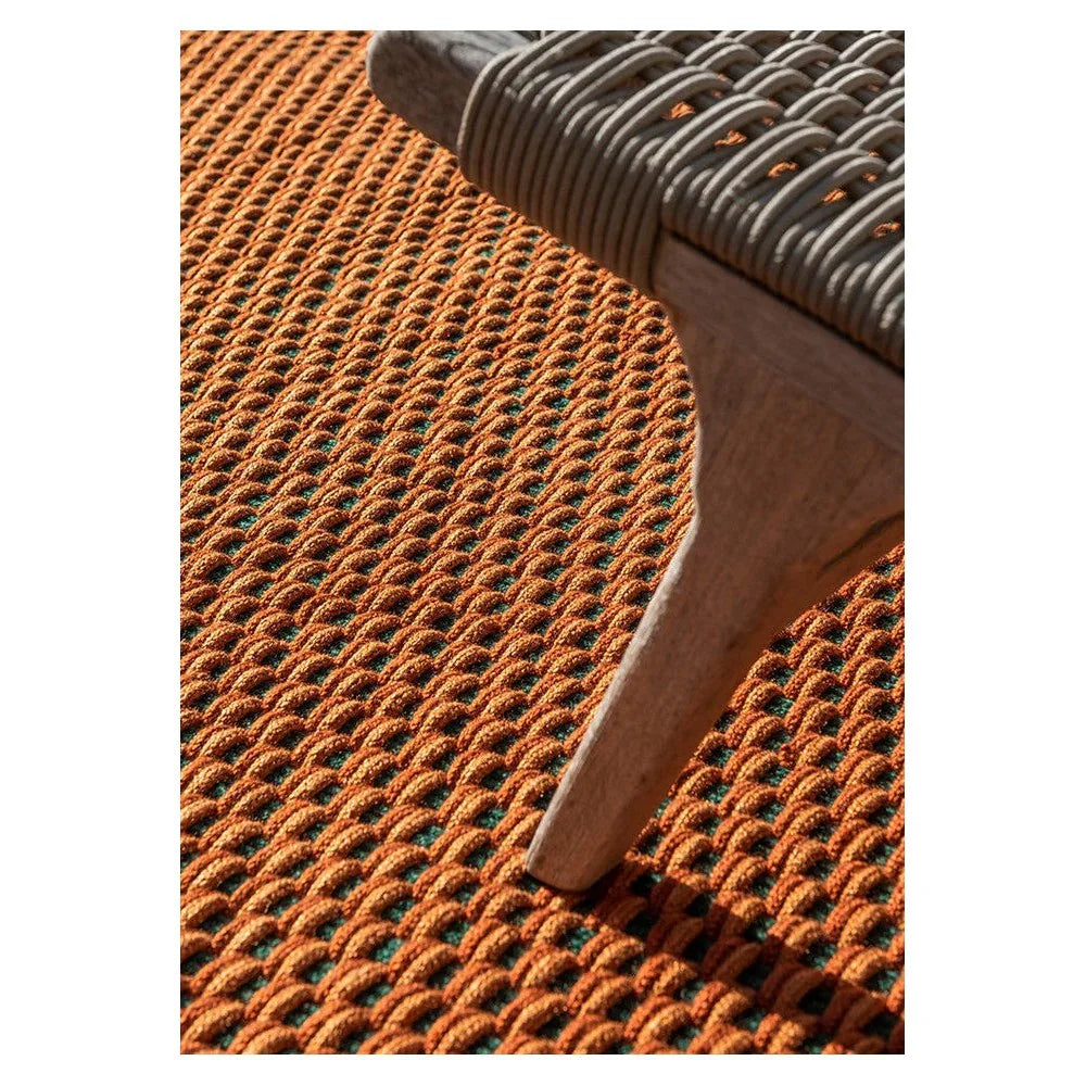 Brink & Campman Lace Tri-coloure Terra Outdoor Rug featuring burnt orange, teal and brown lace-weave on natural background, machine-woven polypropylene
