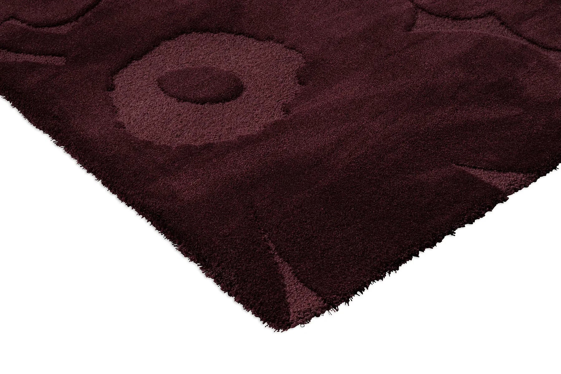 Marimekko Unikko Burgundy rug featuring circle motif in burgundy, plum and wine on white background, tufted wool
