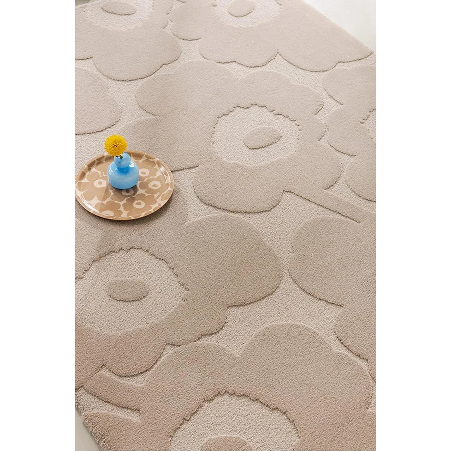 Marimekko Unikko Light Beige Rug featuring large floral poppy pattern in beige and sand on pale beige background, machine-made rug