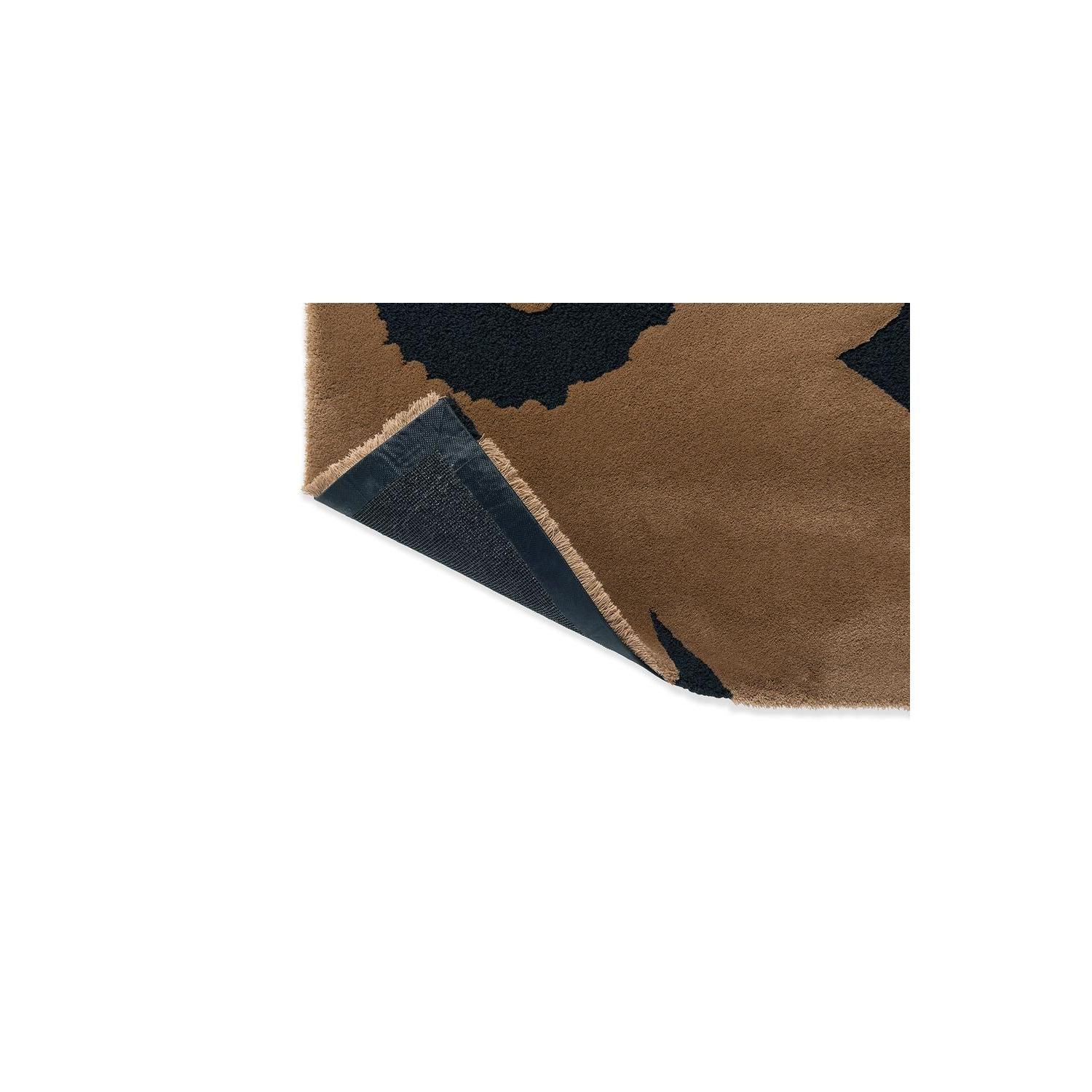 Marimekko Unikko Beige Rug featuring bold floral pattern in beige, black and navy on warm cream background, hand-tufted wool