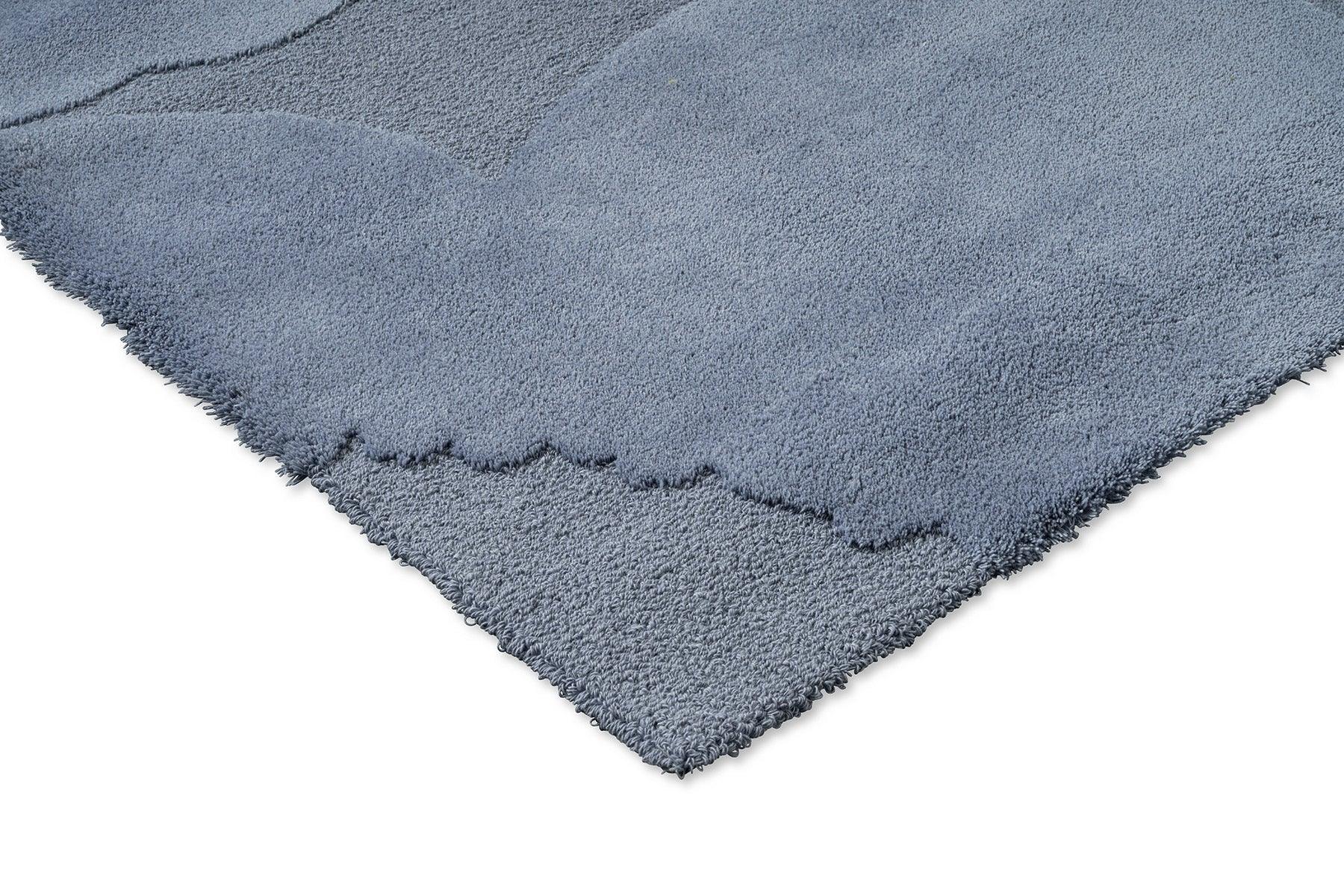 Marimekko Iso Unikko Dusty Blue Rug featuring shag texture in dusty blue and navy on white background, machine-woven polyester