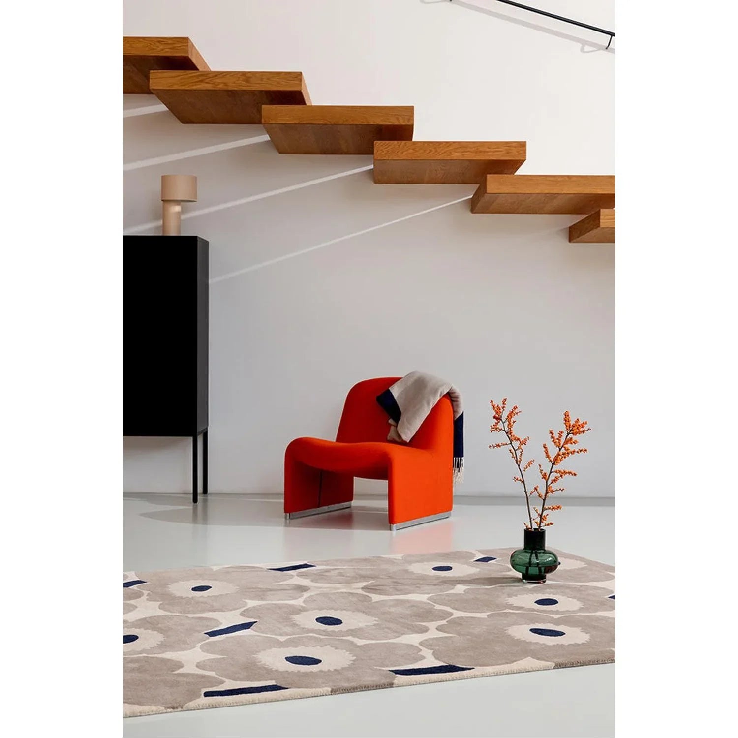 Marimekko Unikko Greige rug featuring bold floral pattern in cream, taupe and navy on greige background, machine-woven wool