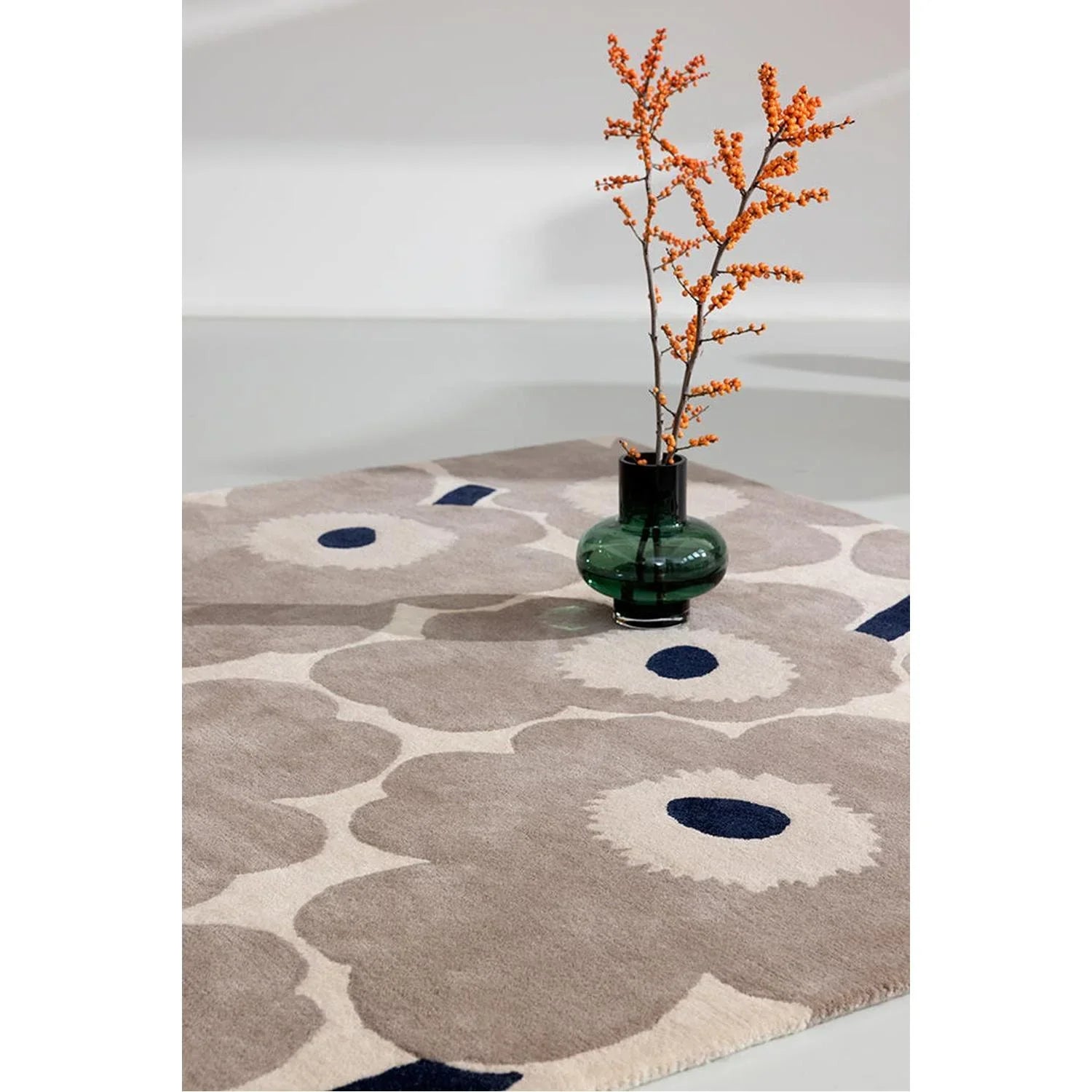 Marimekko Unikko Greige Rug featuring floral pattern in beige, cream and navy on greige background, machine-woven wool