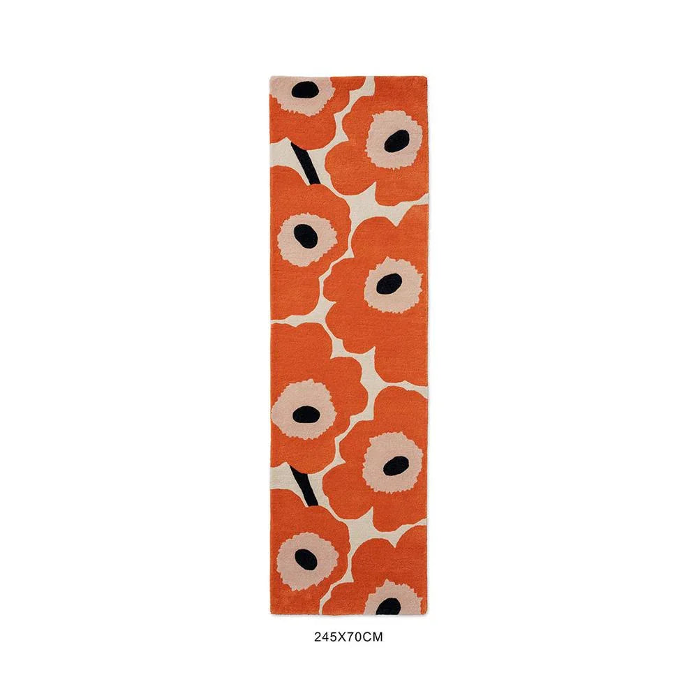 Marimekko Unikko Runner Rug featuring bold poppy pattern in orange-red, cream and black on ivory background, tufted wool