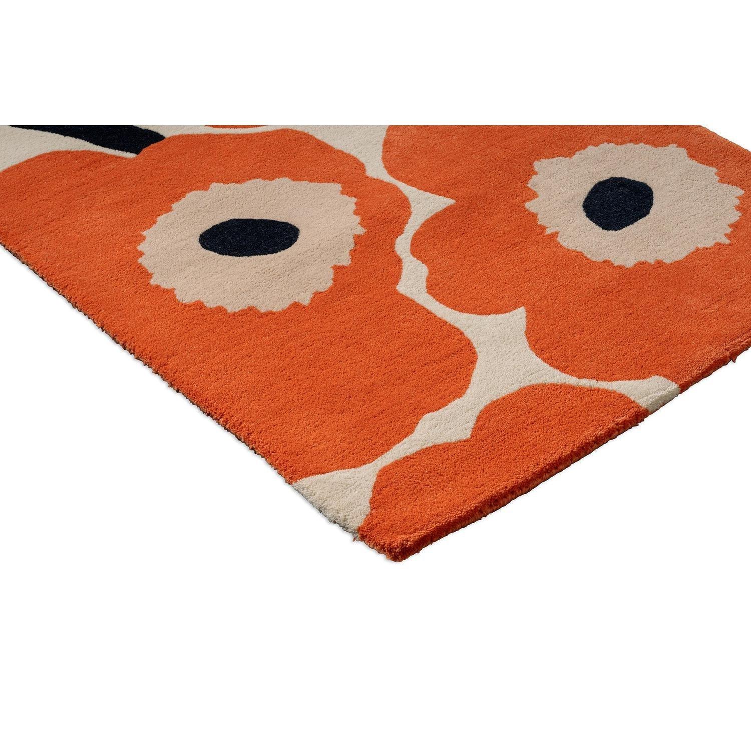 Marimekko Unikko Orange Red Runner Rug with bold orange poppies, cream centers and navy cores on beige, hand-tufted wool