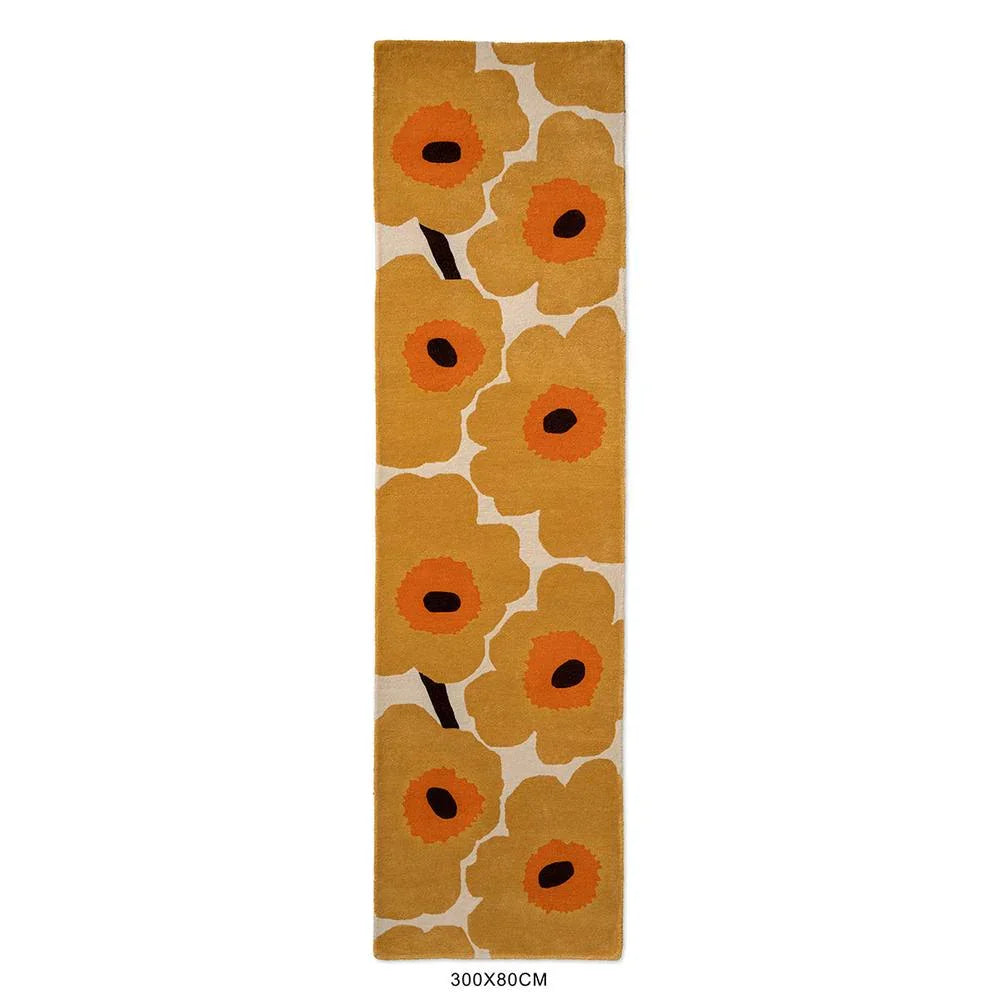 Marimekko Unikko Honey 132406 Rug featuring poppy pattern in honey yellow and orange on cream background, tufted wool