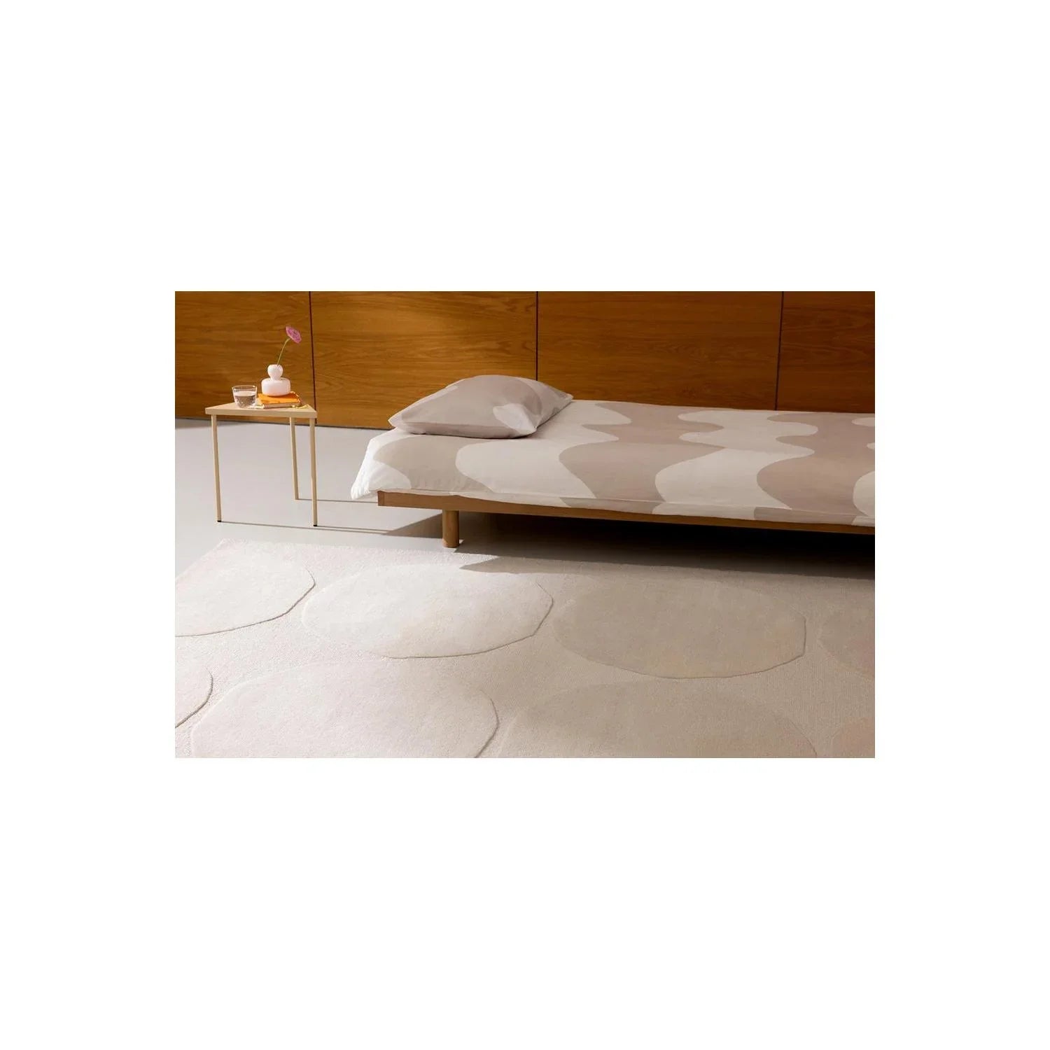 Marimekko Isot Kivet Natural Rug by Brink & Campman featuring circular pattern in natural white, cream and beige on ivory background, hand-tufted wool
