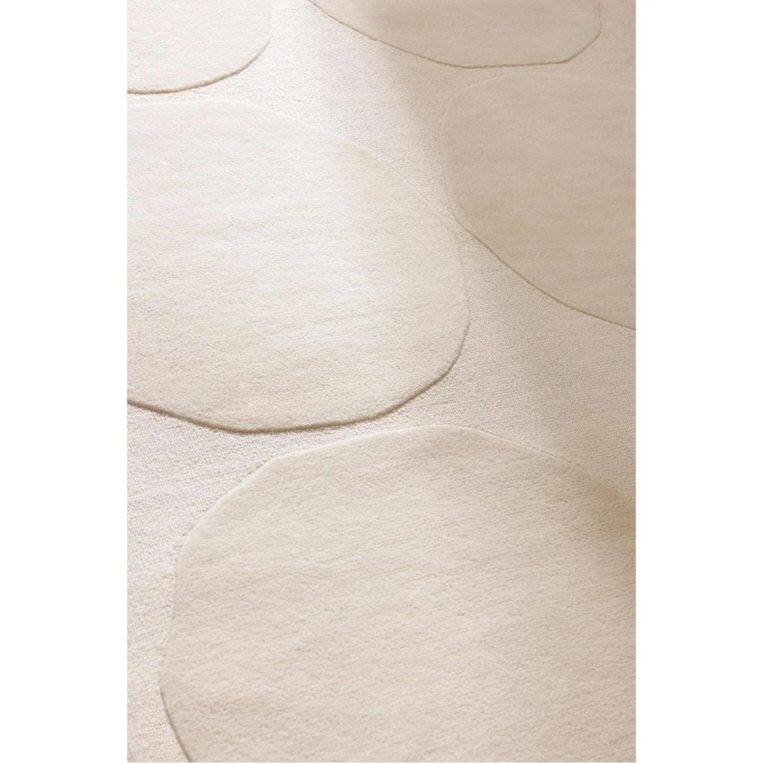 Marimekko Isot Kivet natural white rug with circular pebble pattern in cream on ivory, hand-tufted wool