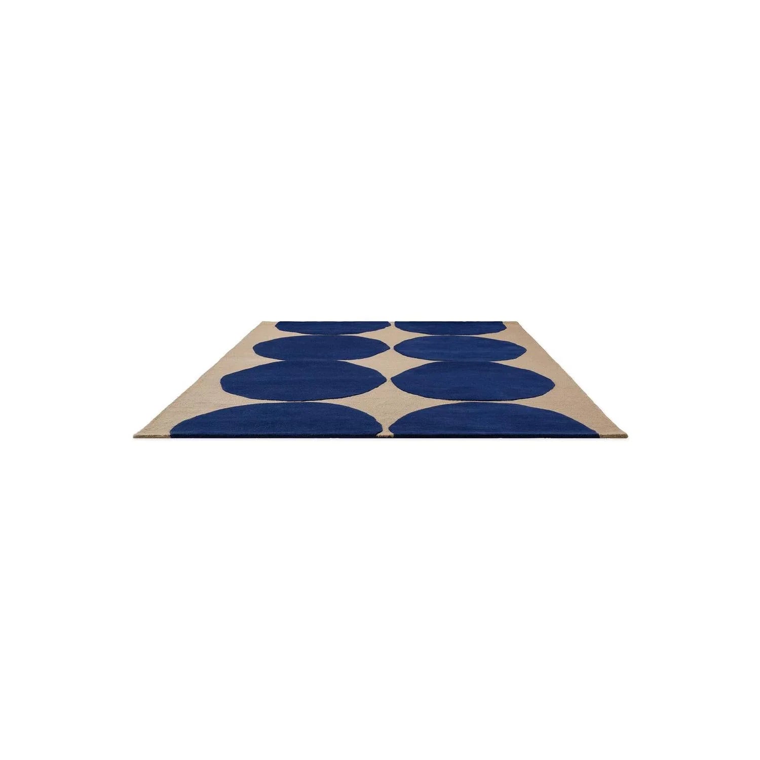 Marimekko Isot Kivet Blue rug featuring large cobalt blue circles on beige background, woven cotton