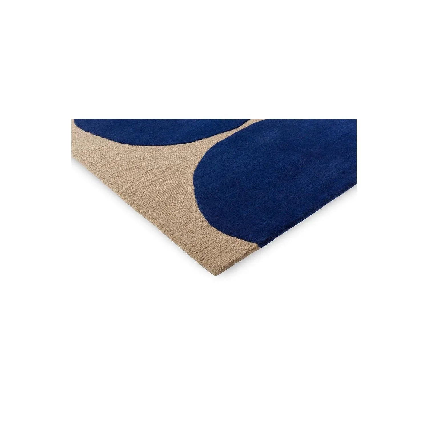 Marimekko Isot Kivet Blue Designer Rug featuring bold navy blue circles on beige background, machine-woven wool blend