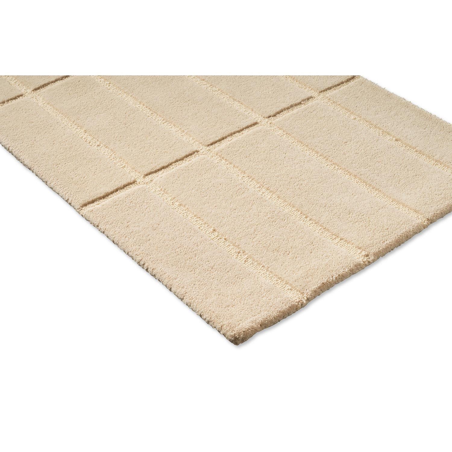 Marimekko Tiiliskivi Runner Rug featuring grid pattern in beige, cream and ivory on white background, tufted wool