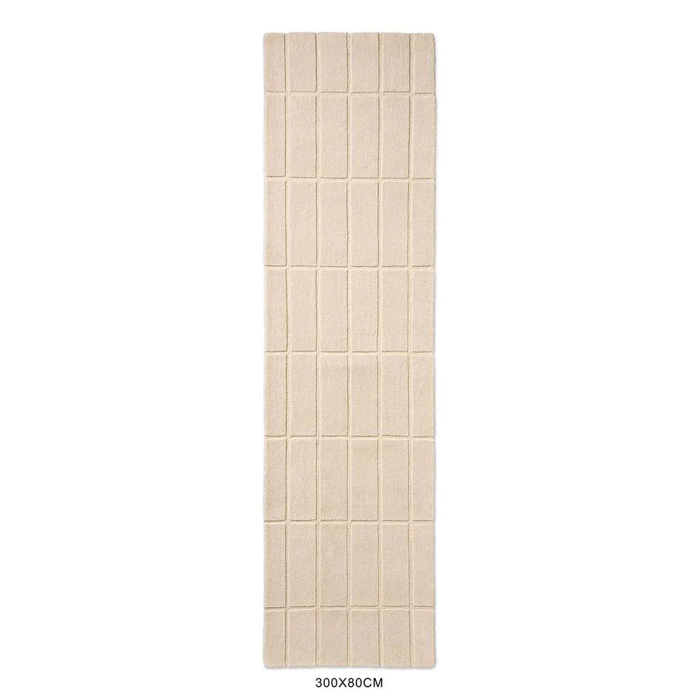 Marimekko Tiiliskivi Natural White 132901 Rug with grid tile pattern in cream and ivory on white, machine-woven cotton