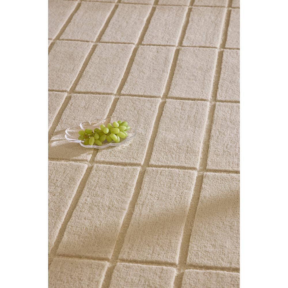 Marimekko Tiiliskivi rug featuring grid pattern in warm beige, ivory on white, construction: unknown, material: unknown