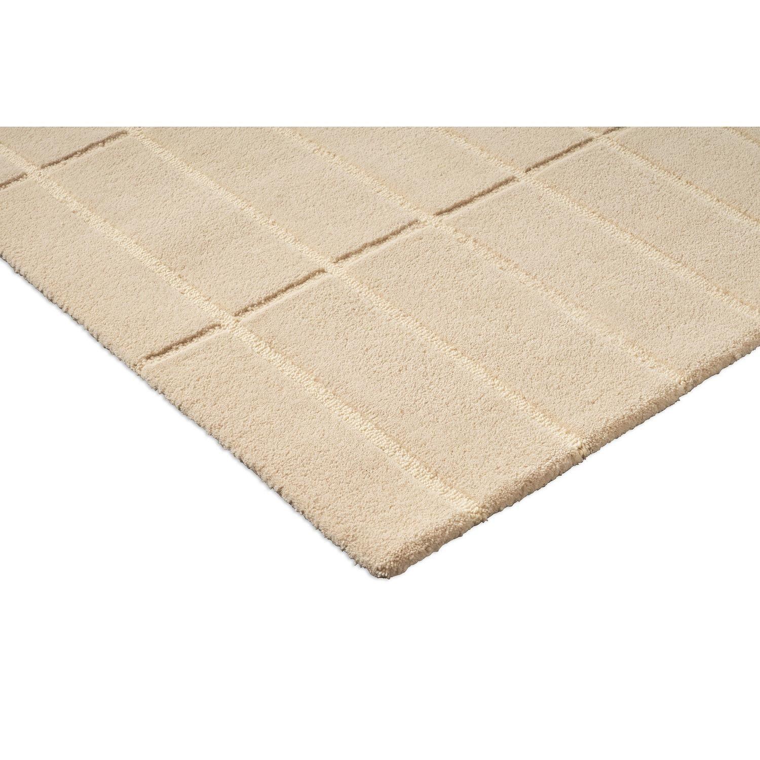 Marimekko Tiiliskivi Natural White 132901 Rug featuring brick-grid pattern in white, cream and beige on white background, hand-tufted wool