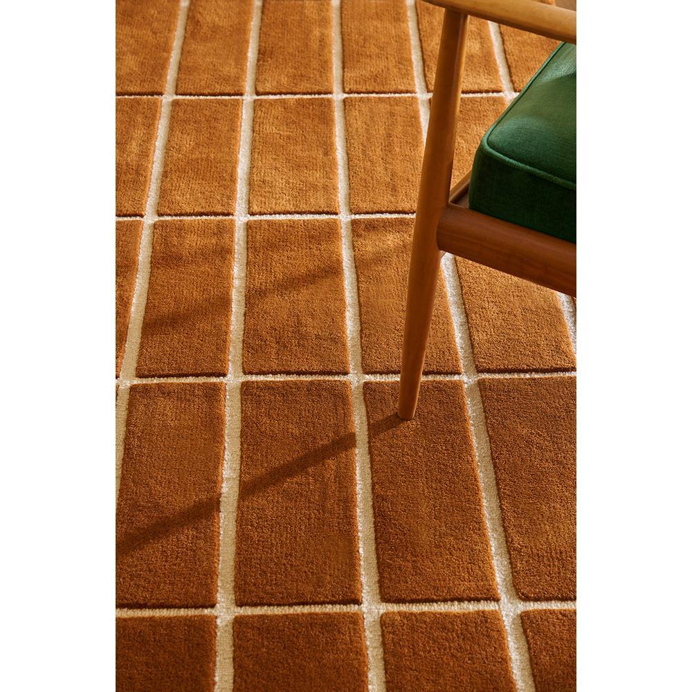 Marimekko Tiiliskivi Brown Rug featuring grid tile pattern in burnt orange, ivory on cream background, hand-tufted wool