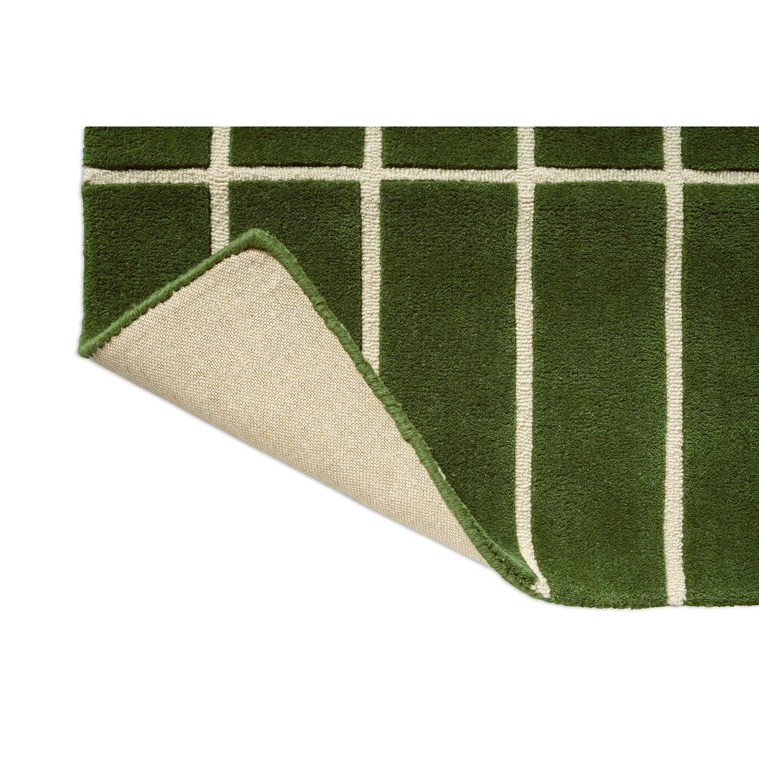 Marimekko Tiiliskivi Green 132907 Runner Rug grid pattern in forest green and cream on dark green background tufted wool