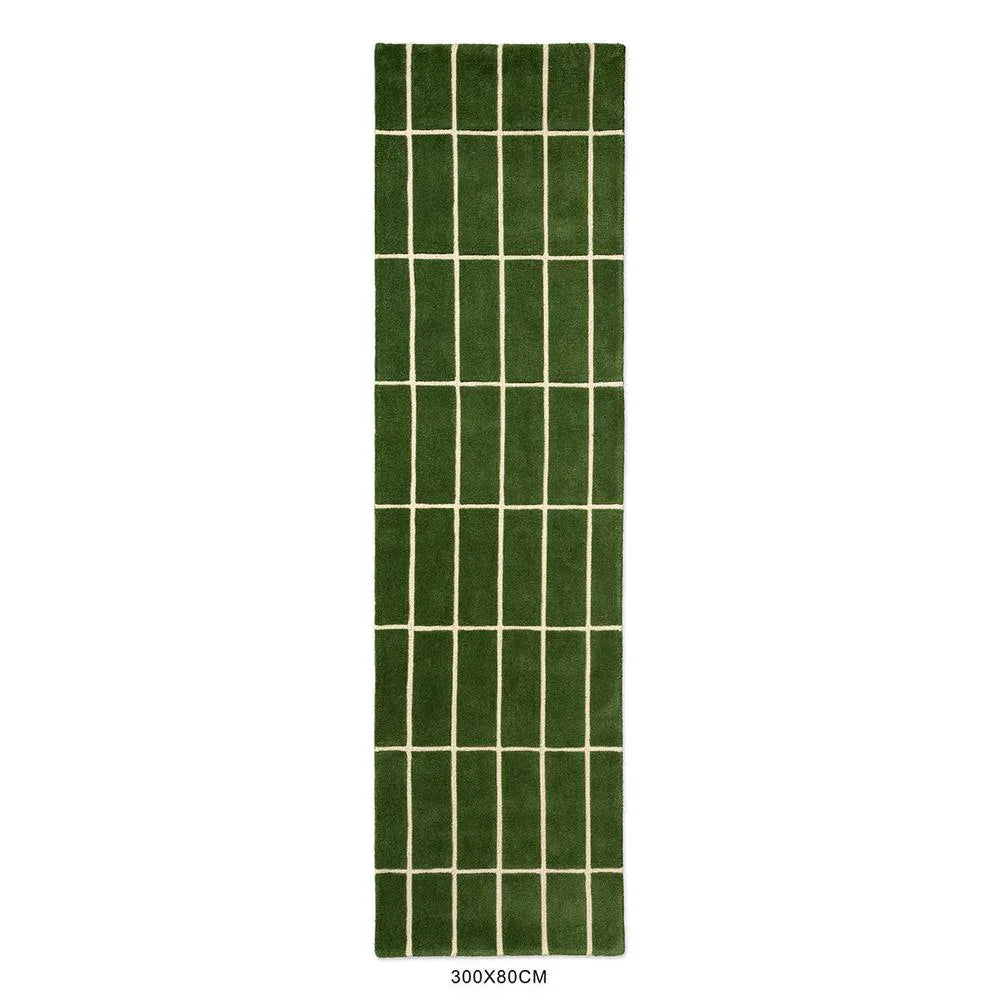 Marimekko Tiiliskivi Green 132907 Rug featuring grid pattern in dark green and ivory on green, machine-made textile
