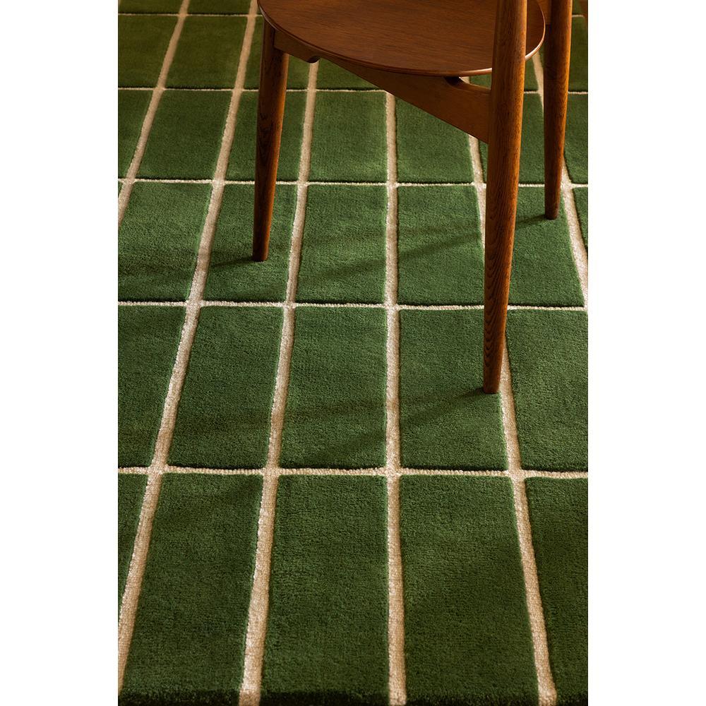 Marimekko Tiiliskivi Green 132907 Rug featuring grid pattern in dark green, olive, cream on green base, woven wool