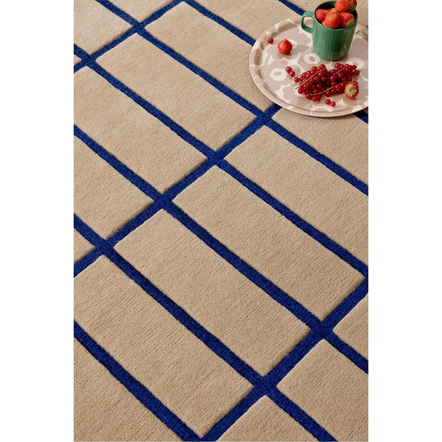 Marimekko Tiiliskivi Bright Blue Designer Rug featuring geometric grid pattern in bright blue over beige background, hand-tufted wool
