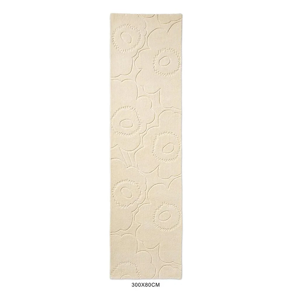 Marimekko Piirto Unikko Natural White 133701 Rug featuring Unikko pattern in natural white, ivory on cream, tufted wool